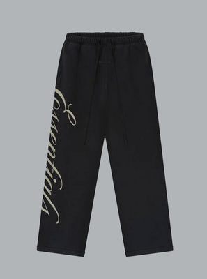 Black sweatpants with white text on a gray background