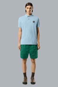 95% biologisch katoen / 5% elastaan piqué poloshirt, lichtblauw