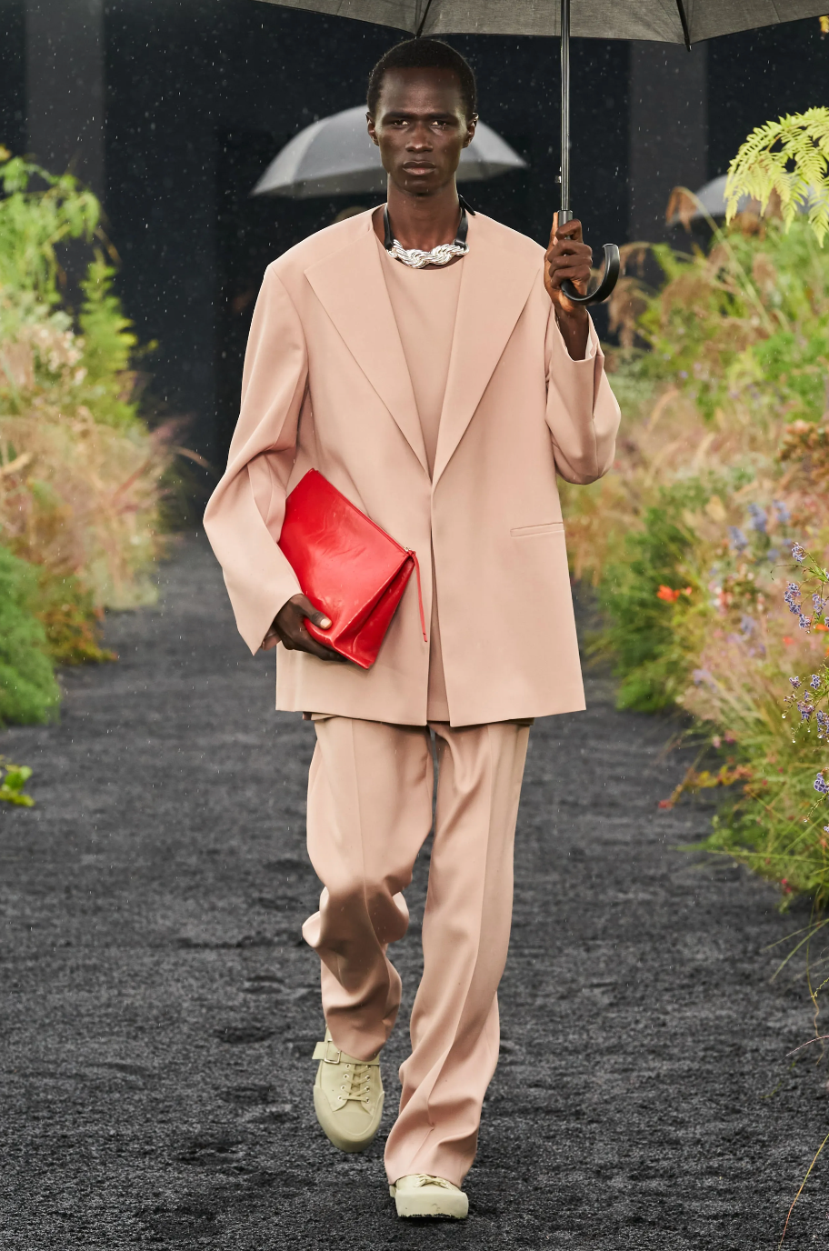 [Jil Sander] refocuses its SS23 collection on [sensible] unisex [tailoring]