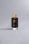 Black Gold Black elegant black and gold bottle of luxury eau de parfum with sophisticated design, representing high-end fragrance and style.