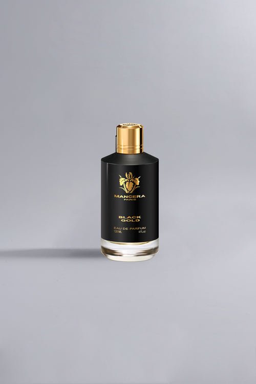 Black Gold Black elegant black and gold bottle of luxury eau de parfum with sophisticated design, representing high-end fragrance and style.