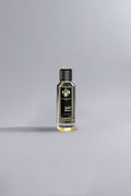 Black Vanilla Black perfume bottle with a sleek black and gold design, highlighting luxury and elegance in fragrance presentation.