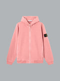 Pink hoodie with a brand logo on the sleeve against a gray background