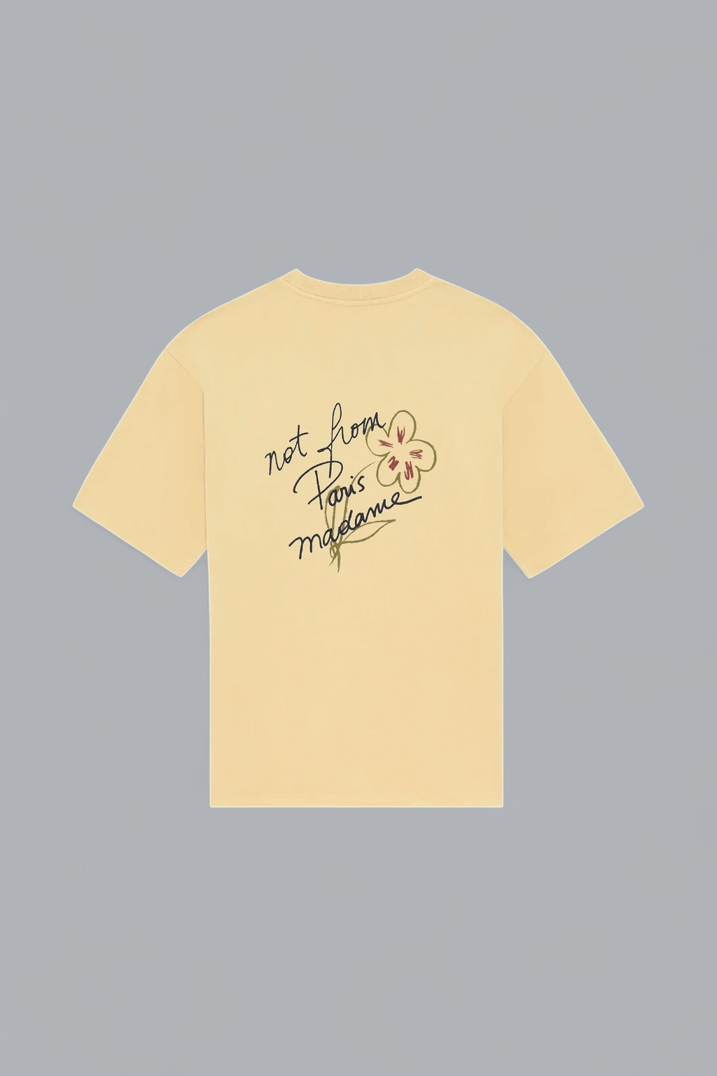 Yellow t-shirt with text and graphic on a gray background