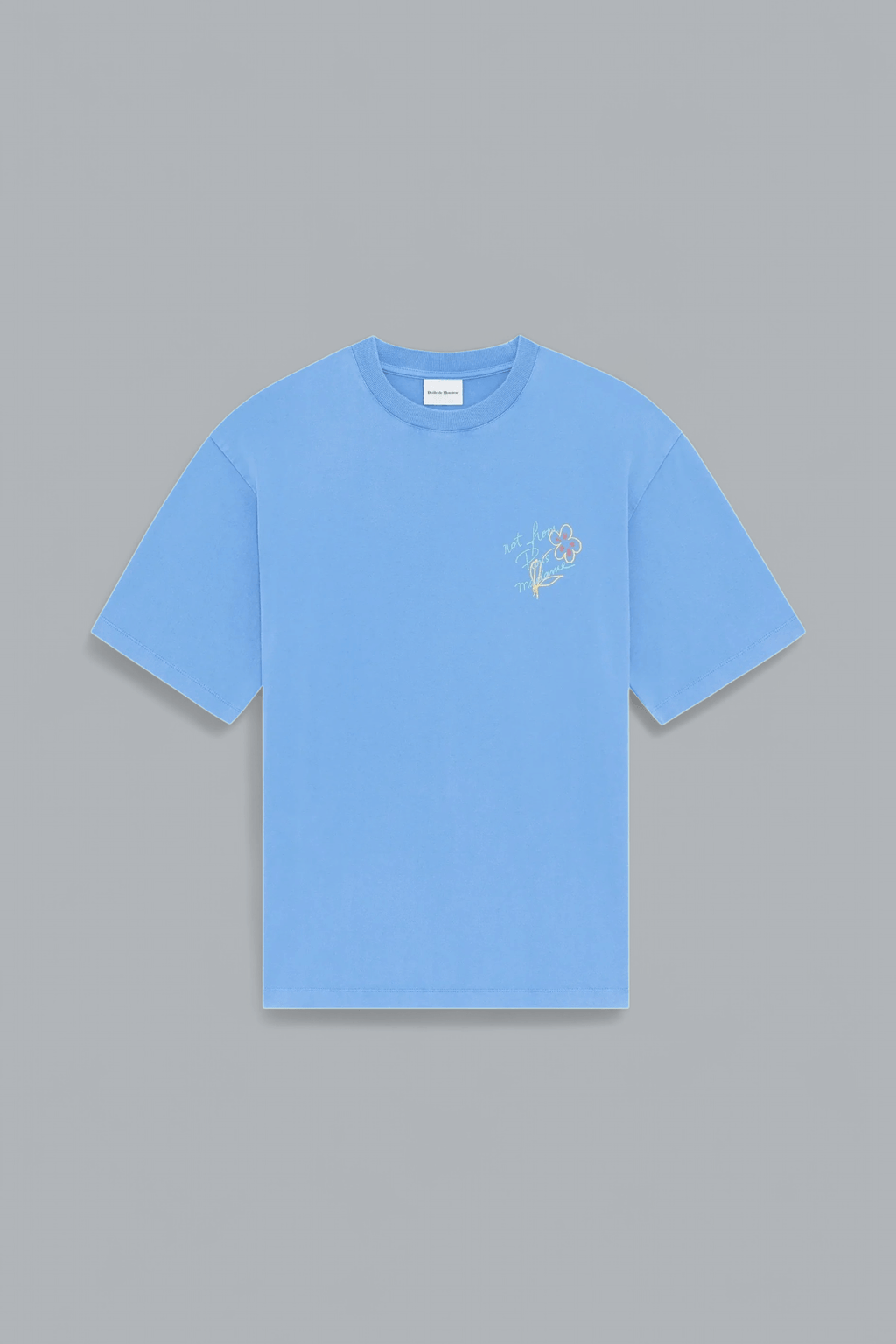 Blue t-shirt with a small graphic on a gray background