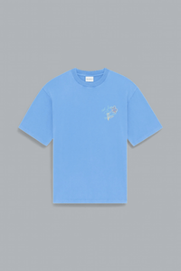 Blue t-shirt with a small graphic on a gray background