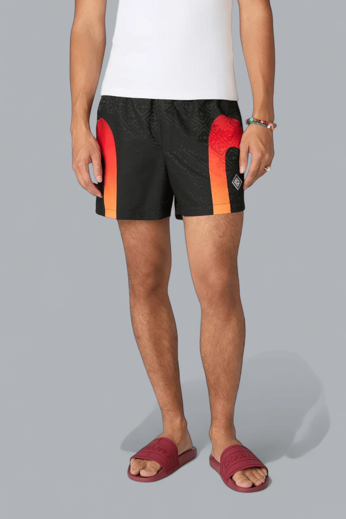 GRADIENT PANEL MONOGRAM SWIM SHORTS