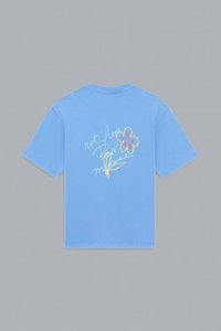 Light blue t-shirt with floral design and text on a gray background