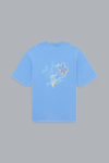 Light blue t-shirt with floral design and text on a gray background